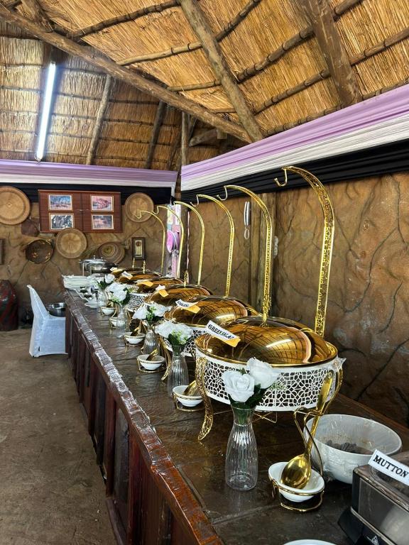 Gold chafing dishes on the breakfast buffet